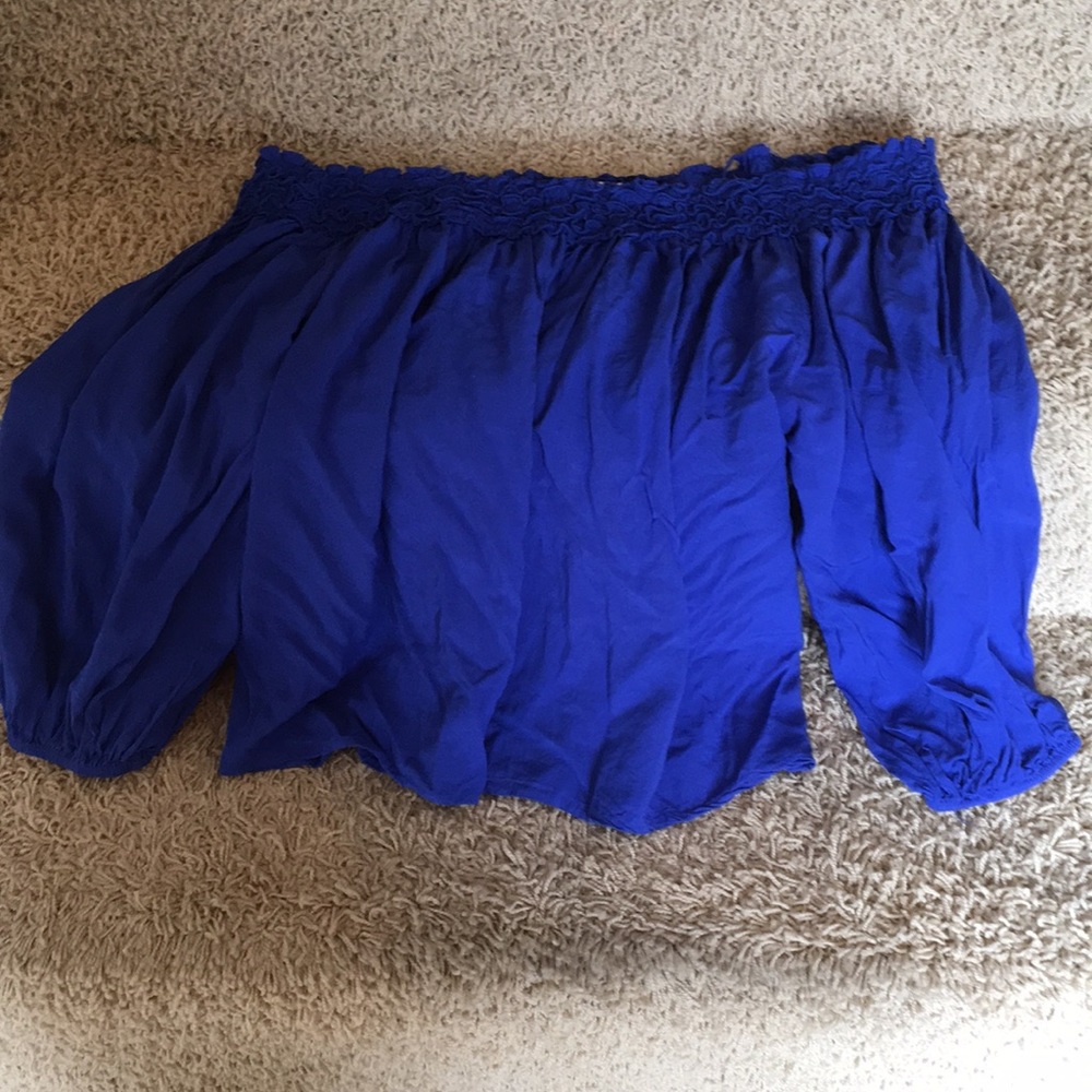 Blue off the shoulder top has straps if needed.